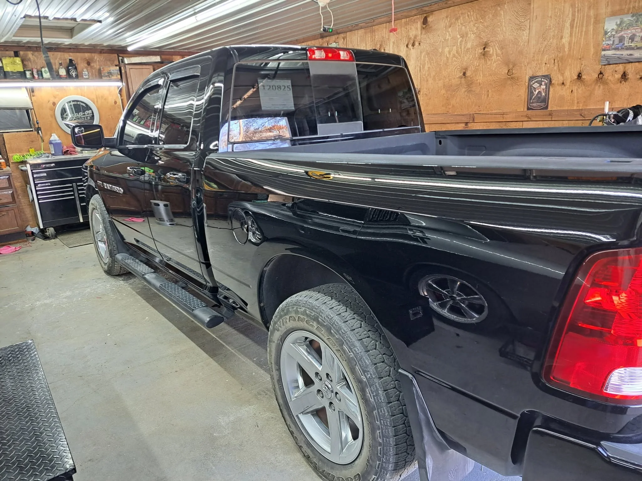 Black RAM 1500 detailed in the garage