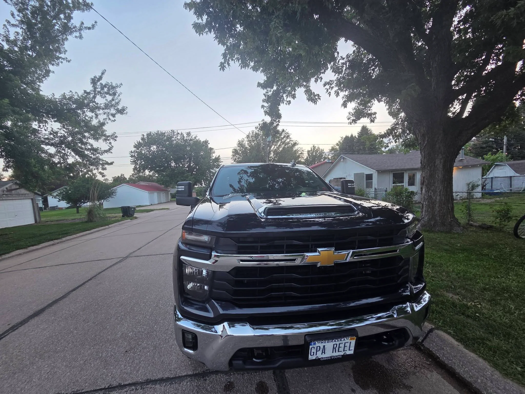 Black Chevy Silverado HD detailed at dusk